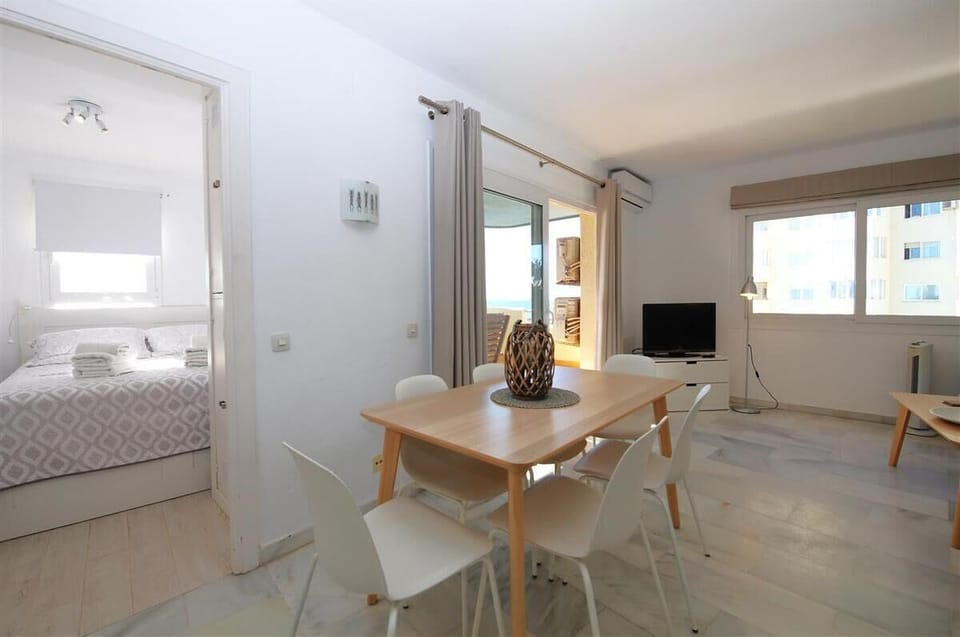 Another view of the modern dining area for six guests